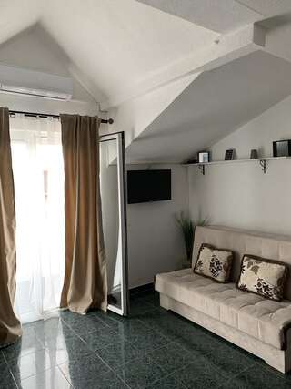 Апартаменты Apartmani Krgušić Тиват Семейный номер-студио-2