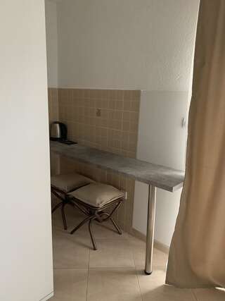 Апартаменты Apartmani Krgušić Тиват Семейный номер-студио-4