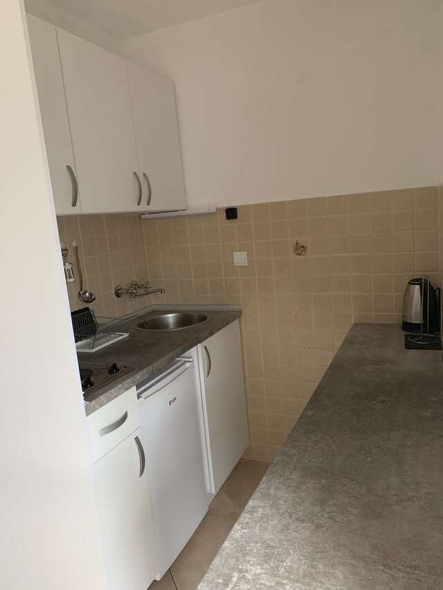 Апартаменты Apartmani Krgušić Тиват-4